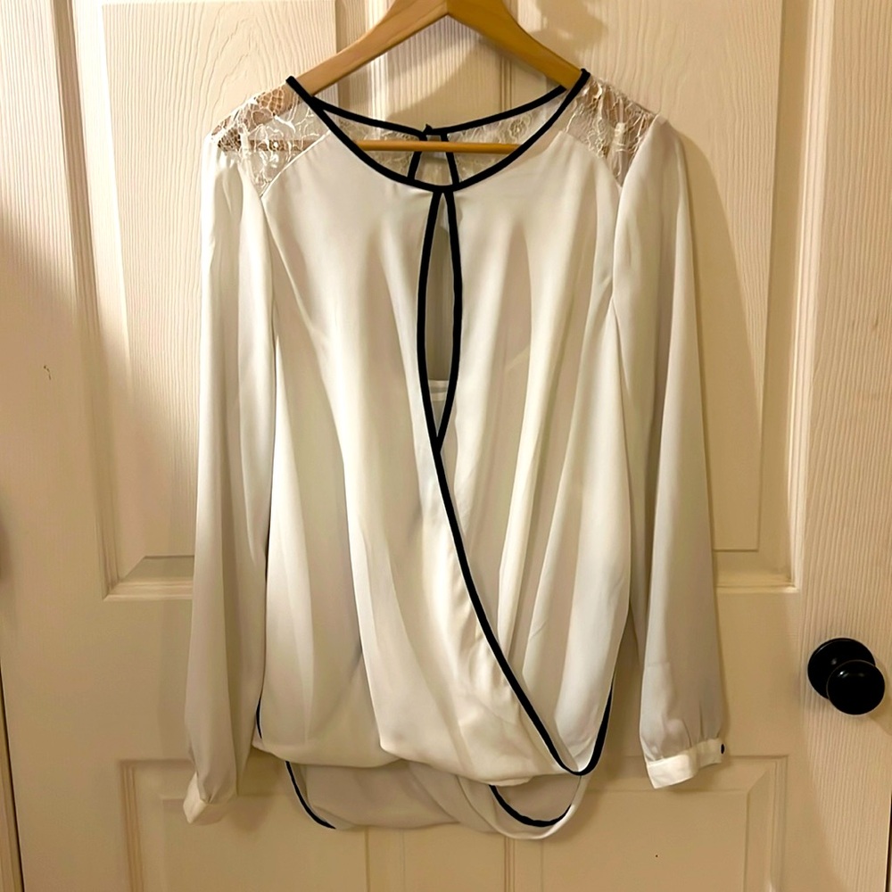Never worn classy white and black blouse and laced top